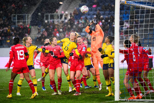 Amanda Ilestedt of Sweden and goalkeeper Elvira Herzog of