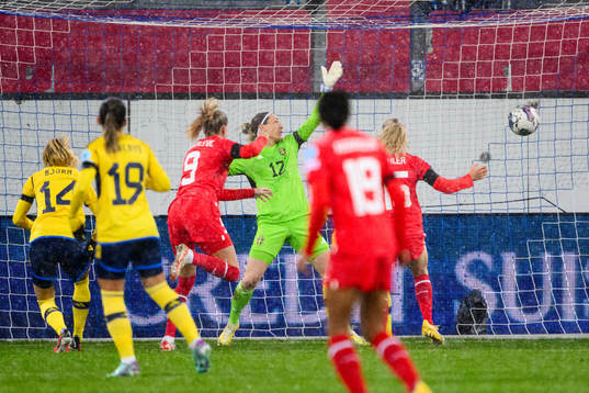 Ana-Maria Crnogorcevic of Switzerland scores 1-0 behind
