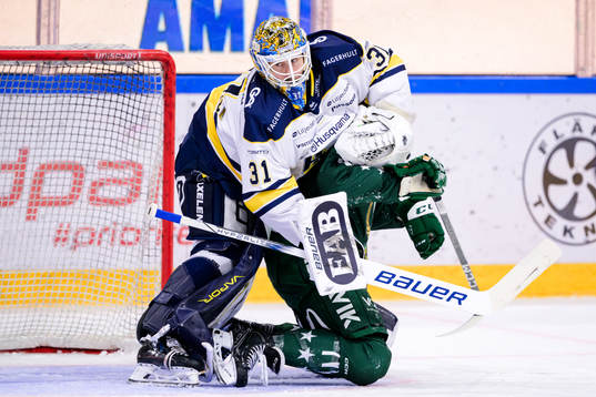 HV71s målvakt Joni Ortio och Färjestads Joakim Nygård