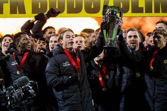 Patrick Berg of Bodø/Glimt celebrates with the trophy