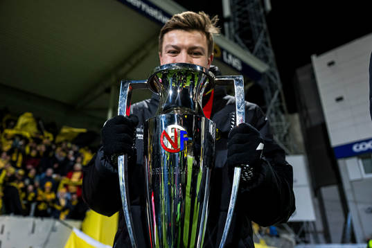 Fredrik Bjørkan of Bodø/Glimt celebrates with the trophy