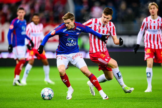Daniel Håkans of Vålerenga and Jostein Maurstad Gundersen