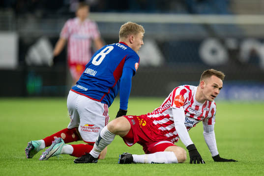 Henrik Bjørdal  of Vålerenga and Kent-Are Antonsen of