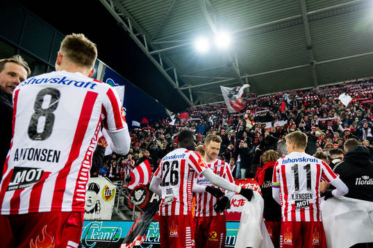 Players of Tromsø celebrate the bronze medal