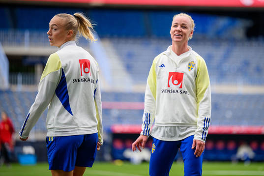 Hanna Bennison and Caroline Seger of Sweden of the