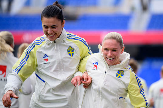 Goalkeeper Zecira Musovic and Jonna Andersson of Sweden of