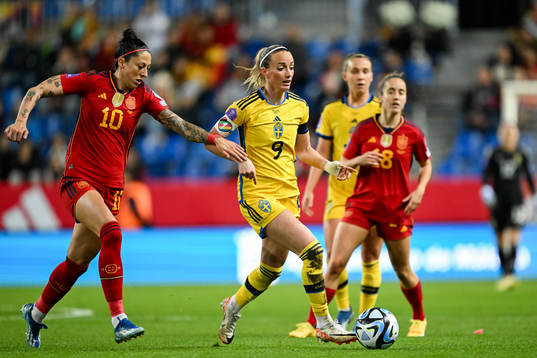 Kosovare Asllani of Sweden and Jennifer Hermoso of Spain