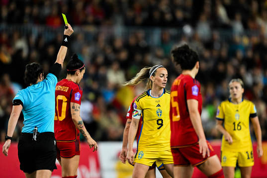 Kosovare Asllani of Sweden receives a yellow card