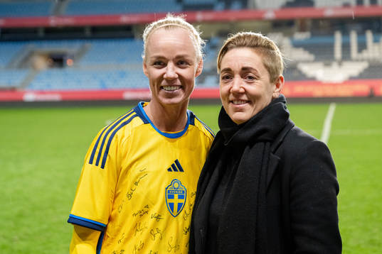 Therese Sjögran and Caroline Seger of Sweden