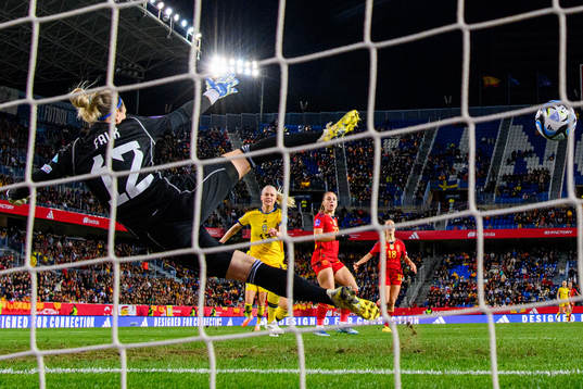 Athenea del Castillo of Spain scores 2-3 behind goalkeeper