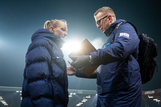 Frida Maanum and Henning Sverdrup, media officer of Norway