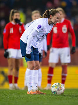 Marit Bratberg Lund of Norway prepares to take a penalty