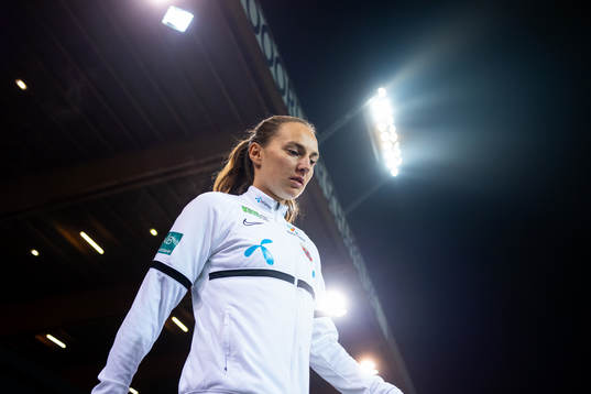 Marit Bratberg Lund of Norway enters the pitch