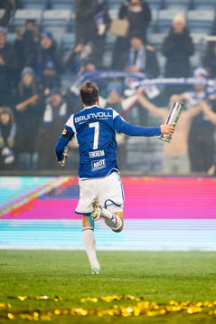 Magnus Wolff Eikrem of Molde celebrates with the trophy