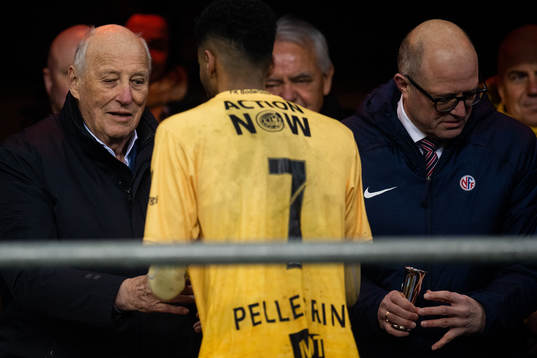King Harald V of Norway and Amahl Pellegrino of Bodø/Glimt