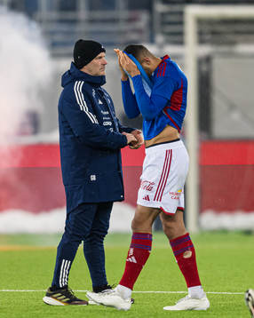 Geir Bakke, head coach of Vålerenga, and Mohamed Ofkir of