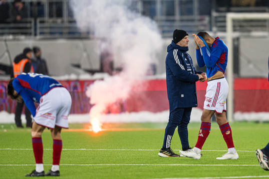 Geir Bakke, head coach of Vålerenga, and Mohamed Ofkir of