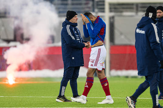 Geir Bakke, head coach of Vålerenga, and Mohamed Ofkir of