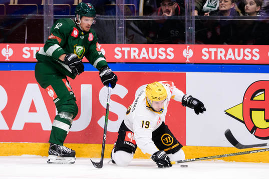 Magnus Nygren of Färjestad and Martins Dzierkals of