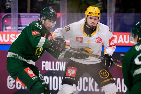 Linus Johansson of Färjestad and Martins Dzierkals of