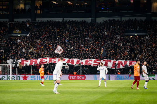 Supporters of Galatasaray with a ”Free Palestine” banner
