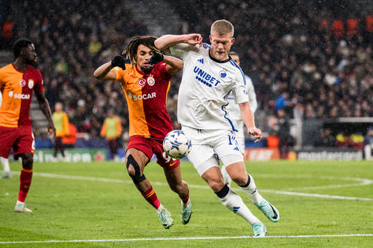 Sacha Boey of Galatasaray and Andreas Cornelius of FC