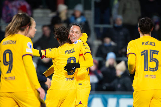 Martina of Barcelona celebrates with team mates