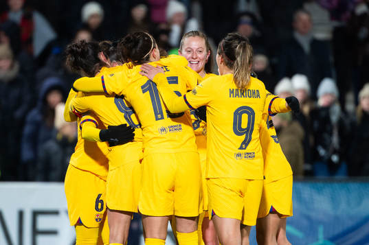 Martina of Barcelona celebrates with team mates