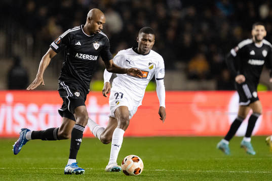Julio Romao of Qarabag and Akoua Romeo Amane of Häcken