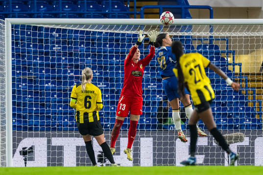 goalkeeper Jennifer Falk of Häcken and Sam Kerr of Chelsea