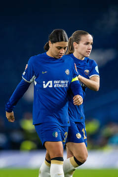 Sam Kerr and Guro Reiten of Chelsea look dejected
