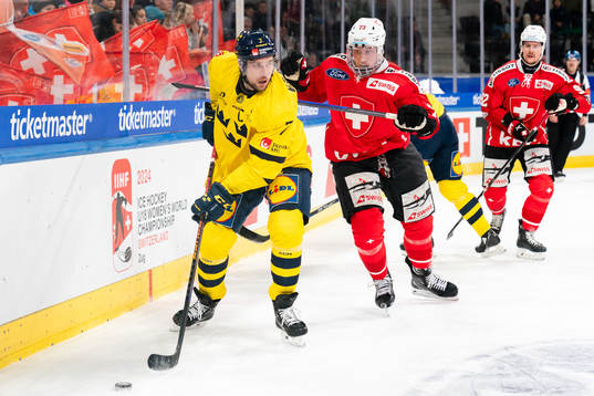 Henrik Tömmernes of Sweden in the ice hockey game between