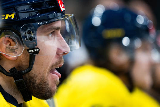 Henrik Tömmernes of Sweden in the ice hockey game between