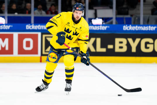Henrik Tömmernes of Sweden in the ice hockey game between