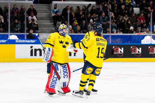 Goaltender Lars Johansson and Marcus Sörensen of Sweden