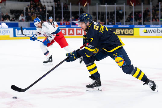 Henrik Tömmernes of Sweden in the ice hockey game between