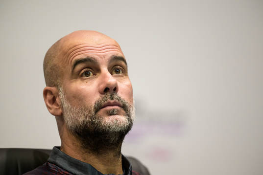 Head coach Pep Guardiola of Manchester City at a press