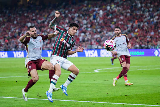 Ali Maaloul of Al Ahly and German Cano of Fluminense
