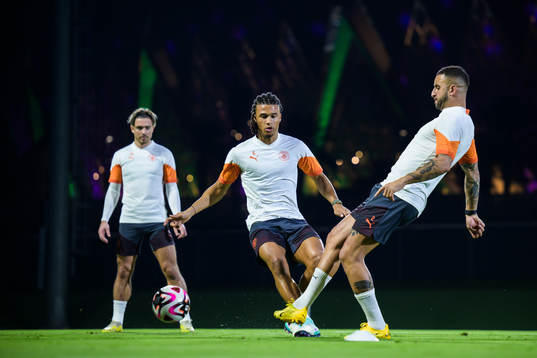 Jack Grealish, Nathan Ake and Kyle Walker of Manchester