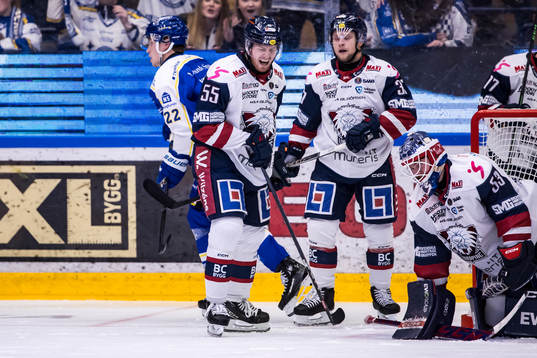 Linköpings Arvid Aronsson och målvakt Marcus Högberg