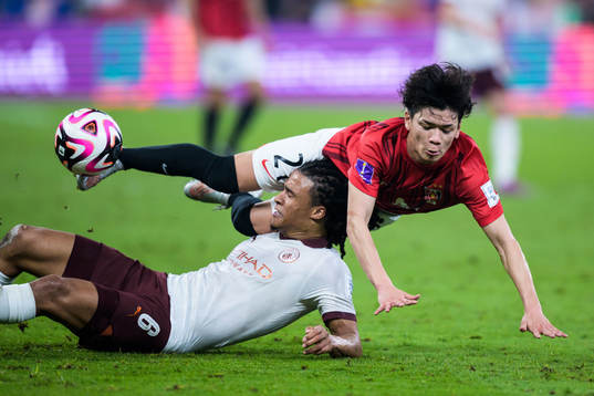 Nathan Ake of Manchester City and Tomoaki Okubo of Urawa