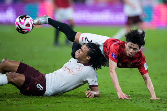 Nathan Ake of Manchester City and Tomoaki Okubo of Urawa