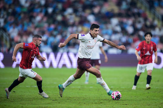 Bryan Linssen of Urawa Reds and Rodrigo of Manchester City