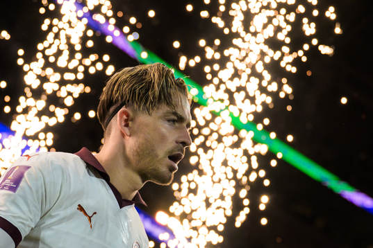Jack Grealish of Manchester City enters the pitch for the