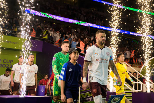 Kyle Walker of Manchester City enters the pitch for the