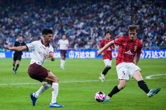 Matheus Nunes of Manchester City and Marius Høibråten of