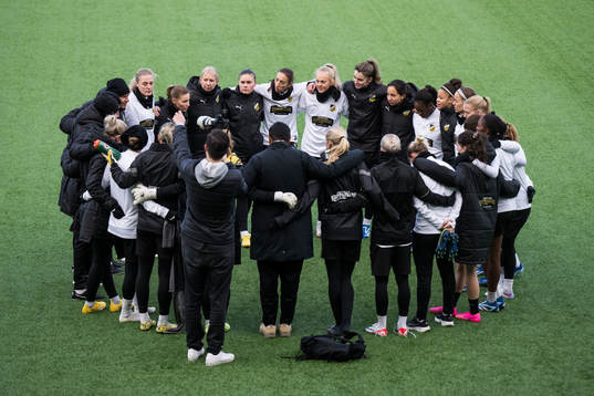 Players and coaches gather
