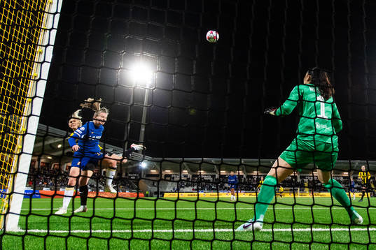 Molly Johansson of Häcken scores a goal behind Niamh
