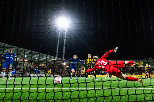 Erin Cuthbert of Chelsea (not pictured) scores 1-2 behind