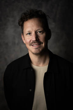 Fredrik Warg, studio Oddset poses for a portrait